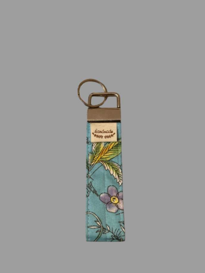 Hand-Sewn Purple Floral Keyfob – Whimsical Blooms on Blue