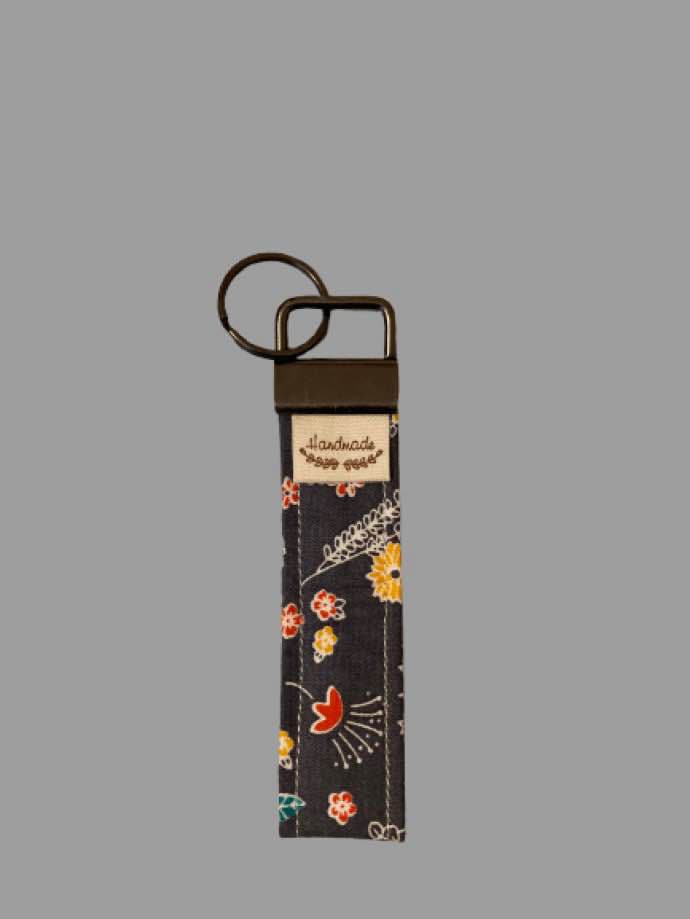 Hand-Sewn Folk Floral Keyfob – Whimsical Blooms on Dark Grey