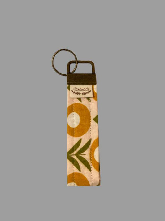 Hand-Sewn Mustard Floral Keyfob – Rustic Charm on Cream